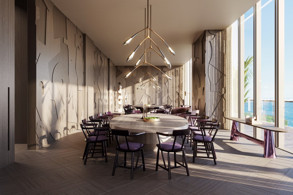 Interior of Jean-Georges Miami Tropic Residences with round table and chairs, kitchen-styled kitchen accessories Jean-Georges iconic chefs